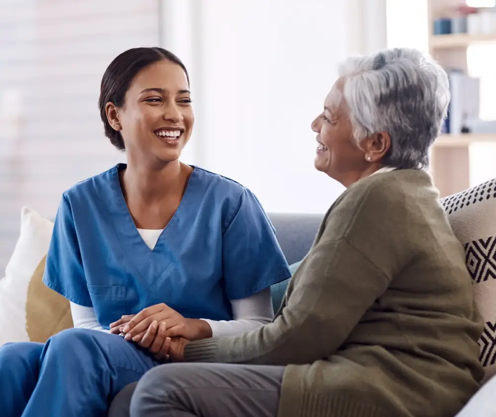 To-see-you-smile-means-Im-doing-my-job-well.-a-young-nurse-chatting-to-a-senior-woman-in-a-retirement-home-scaled To-see-you-smile-means-Im-doing-my-job-well.-a-young-nurse-chatting-to-a-senior-woman-in-a-retirement-home-scaled
